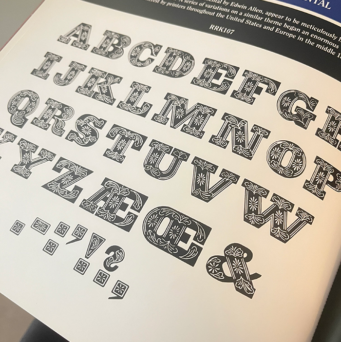 flowery woodtype text image in a book