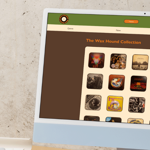 Closeup of desktop computer screen with wax hound homepage on screen